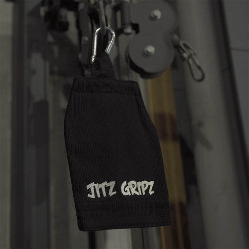 JitzGripz Gi sleeve grip trainer attached to gym cable machine